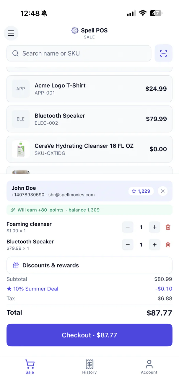 POS sale screen with cart items and checkout button